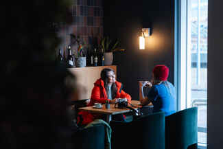 People in coffee house